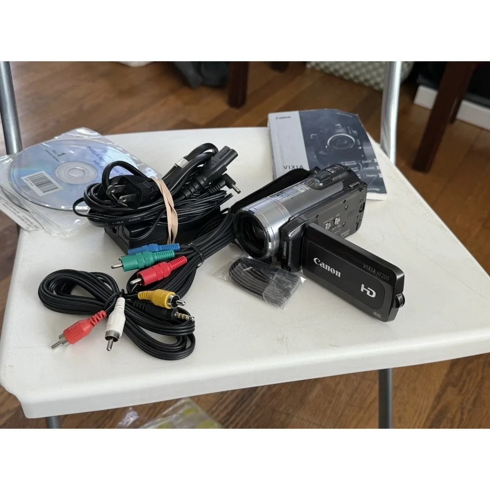 Canon VIXIA HF200 Camcorder Video Camera, With Cords/manual , (not Working)